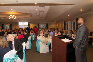 Jarrett M. Adams, Attorney, Innocence Project, NY, NY, former scholarship recipient addresses South Suburban College Foundation (SSCF) supporters at their most recent fundraiser. 