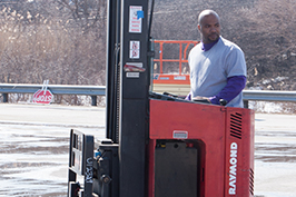 Photo of a forklift driver