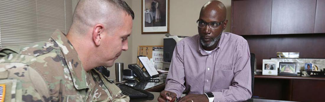 Photo of a Soldier with a counselor