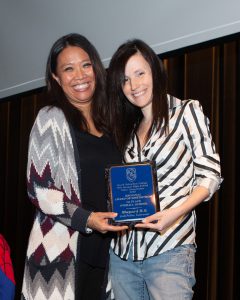 Jodi Pelini, professor at Alan B. Shepard High School, accepts the Regional Award of Distinction from Pamela Planera, SSC Graphic Design & Visual Communications coordinator.